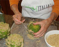 man preparing the artichoke dish